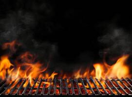 A close-up of a grilling surface with flames and smoke. photo
