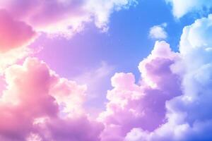 A serene sky filled with soft pink and blue clouds at twilight. photo
