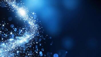 A vibrant blue abstract background with sparkling light effects. photo