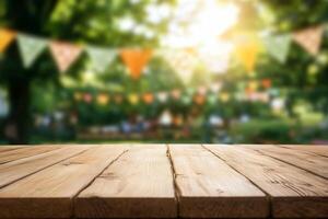 A wooden table in a blurred outdoor setting with festive decorations. photo