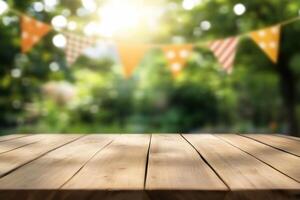 Empty wooden table with bunting flags in the background photo