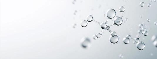 Close-up of water droplets on a light background, emphasizing purity. photo