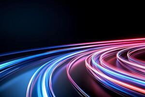 Abstract light trails in vibrant colors on a dark background. photo