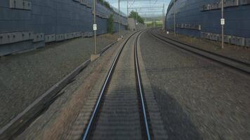 A train is traveling down a track with a hill in the background video