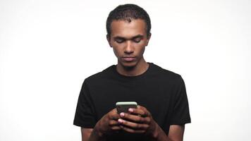 Man reacting to smartphone with a smirk and shrug video