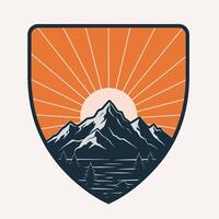 A mountain range with a sun in the center vector
