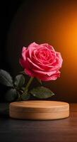 Natural beauty podium backdrop for product display showcasing a vibrant pink rose flower, with dew drops glistening on its petals, placed on a wooden podium, illuminated by soft, warm lighting. photo