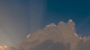 Time-lapse of the sunbeams projected through dense clouds at the afternoon, over the eastern Andean mountains of central Colombia. video