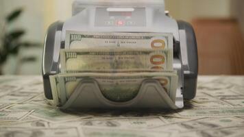 Cash Counting in Automatic Money Counter Machine Dolly Zoom video