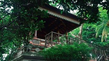 Tranquil Asian Pavilion Surrounded by Lush Greenery video
