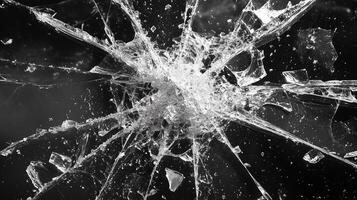 Broken glass surface isolated on black background. 6 photo