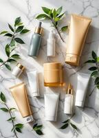 various cosmetic products on a marble surface with leaves arround it. Luxurious Skincare Collection photo