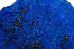 Macro Azurite close up mineral stone with Pyrite inserts on a white background photo