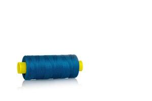 a skein of threads of blue color close up macro on a white background close up photo