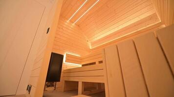 Modern wooden cabin interior with cozy lighting setup in unique design video