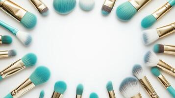 Cosmetic brushes frame, placed in random order, on a white background. 2 photo