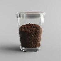 Glass container of coffee grounds, on a white background. 3 photo
