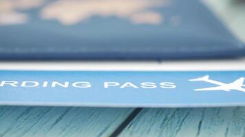 Travel plans take shape with a boarding pass on a blue table video