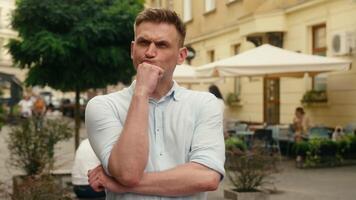 Caucasian man guy thinking tourist outdoors planning pondering smart clever businessman male traveler think consider choose decide happy insight create idea answer plan solution in city urban street video