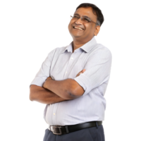 Business professional smiling confidently while standing with arms crossed in a formal setting isolated on transparent background png