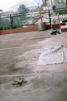 Concrete rooftop scene with mountain backdrop on a quiet, calm morning photo