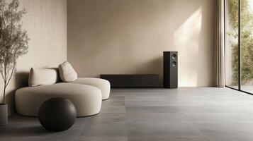 A minimalist modern living room with a beige walls, a beige sofa, and a black speaker. 20 photo