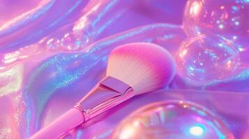 A makeup brush with large bubbles around it, against neon pink fabric. 4 photo