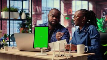 African American couple fighting while they fix Wi-Fi setup next to copy space, troubleshooting router errors to maintain efficiency in their self employed careers. Angry freelancers. Camera B. video