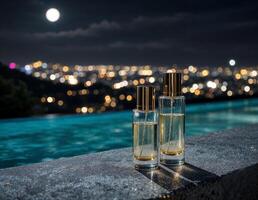 Perfume bottle on the edge of a swimming pool with a view of the night city. Night Perfume photo