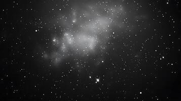 A mesmerizing view into deep space, speckled with countless stars and a vast, ethereal nebula. The dark expanse is punctuated by points of light. photo