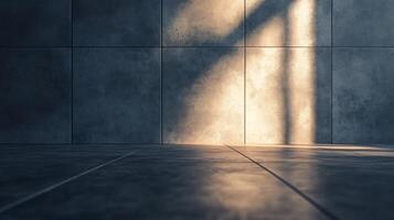 Modern Interior A stark contrast of light and shadow on a concrete tiled floor and wall create a dramatic and minimalistic ambiance. photo