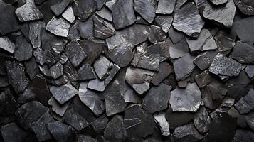 Rough-hewn rock texture featuring various shapes and depths. The play of light and shadow creates a dramatic backdrop. photo
