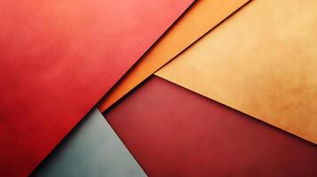 An abstract colorful display of orange, red and gray shapes overlap to create an interesting texture and layered effect in diagonal arrangement. photo