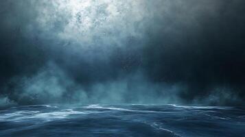 A moody ocean scene with low-lying fog and ominous clouds, creating a dramatic and mysterious atmosphere. Water reflecting light. photo