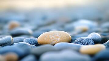Rocks on the beach at sunset in a relaxing way, with sand and sea views in the background. Relax and enjoy the beach. photo