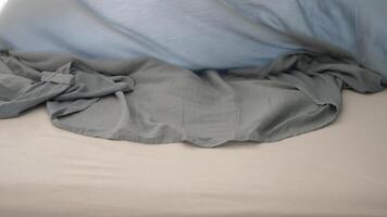 Making a comfortable bed with fresh sheets and blankets video