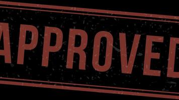 Approved stamp animation with red ink on a dark neutral background. A rubber stamp with a grunge texture creates a realistic effect. Perfect for motion graphics, footage and editing projects video