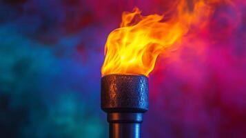 A flame is burning on a black and red background photo