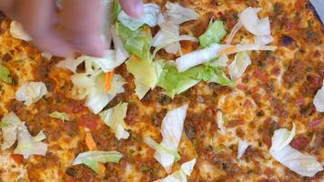 Delicious homemade pizza preparation with fresh toppings video