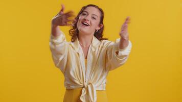 Woman showing inviting gesture with hands, ask to join, beckoning to coming, gesturing hello goodbye video