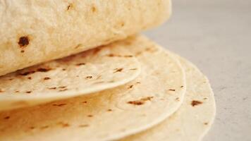 homemade roti chapati on table . video