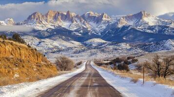 Beautiful vista of a narrow countryside road with rock photo