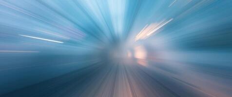 Abstract blue and white light streaks create a sense of speed and movement, converging into a central vanishing point. photo