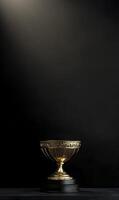 Golden goblet illuminated on a stage symbolizing triumph and achievement showcase success photo