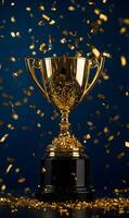 Golden trophy reflecting achievement with falling confetti on a deep gradient background photo