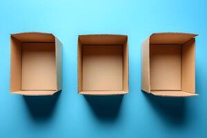 Three Cardboard Boxes on Blue Background for Organization and Shipping Themes photo