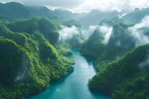 Tranquil Tropical Landscape with Misty Mountains and Serene River photo