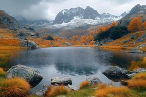 Autumn Tranquility Amidst Dramatic Mountain Peaks and Serene Lake photo