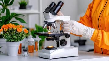 Scientist using a microscope to examine plant samples in a laboratory Research and analysis of botanical specimens photo