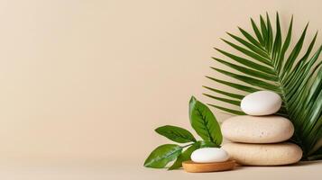 Serene Spa Scene Stacked Stones and Lush Green Leaves on Beige Background Perfect for Wellness and Relaxation Concepts photo